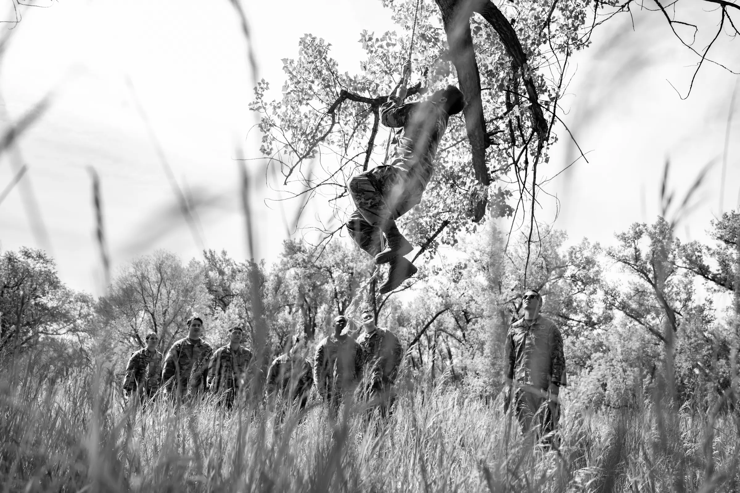 North Dakota Army National Guard Soldiers completing a team rope-climbing exercise